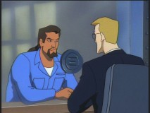 Nearly out of prison, Xanatos confers with his assistant Owen.